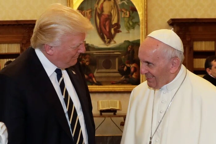 Trump is depicted on the papal throne