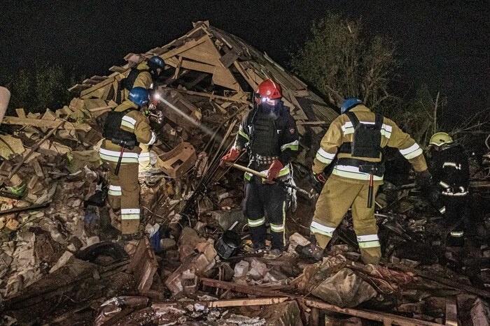 Building damage due to ballistic strike in Kharkiv