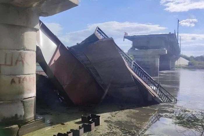 Photo of a destroyed bridge after an explosion