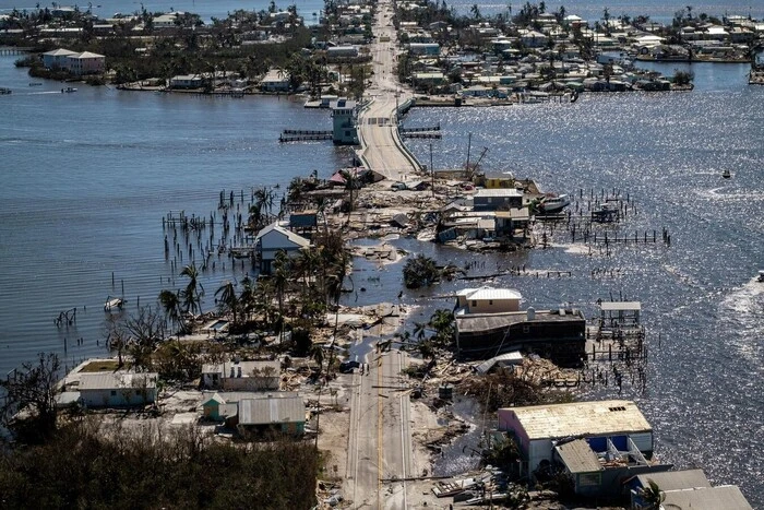 Flooded houses and storms in the picture