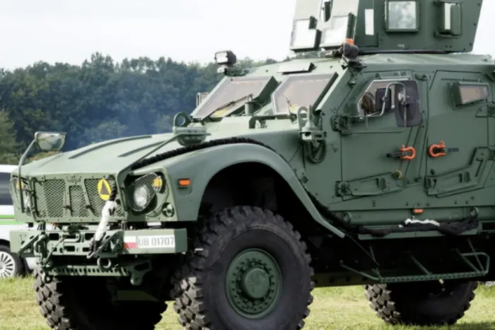 Ukrainian Armed Forces fighters on an armored vehicle named after an Indian chief