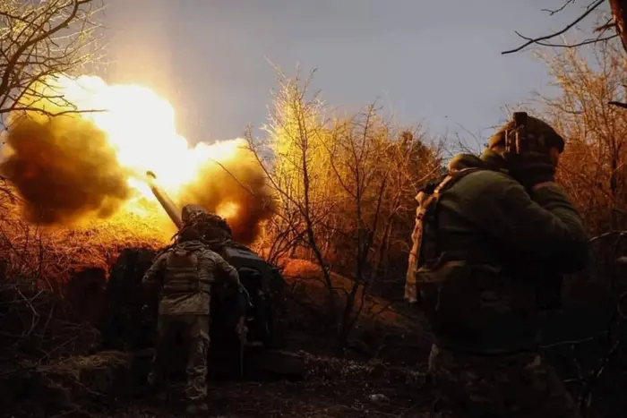 Russian soldiers wear the uniform of the Ukrainian army during the attack on the Kupyansk sector