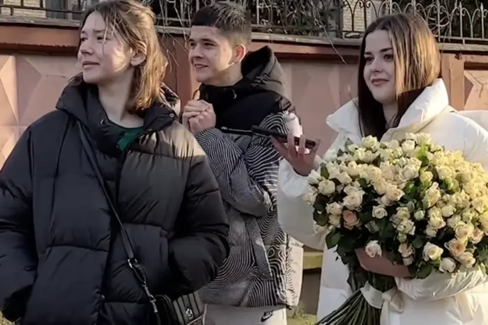 Children meet their mother, the border guard, after a long separation