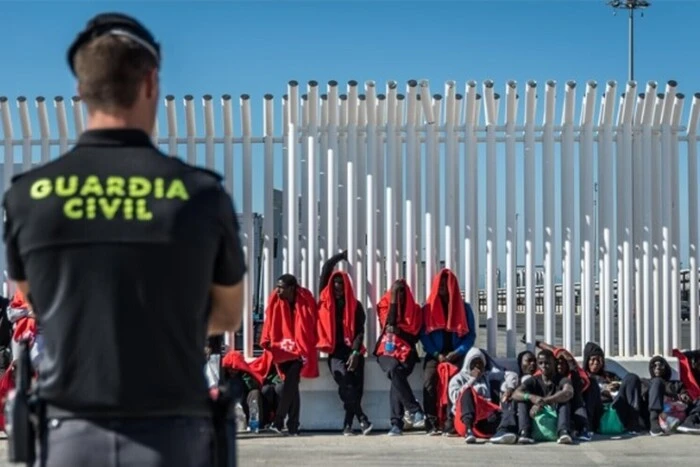 Image of immigrants in the Spanish Parliament