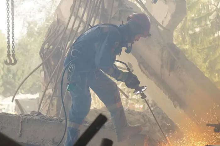 People under the rubble in Poltava