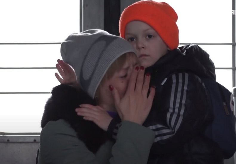 Image of children returning to Ukraine