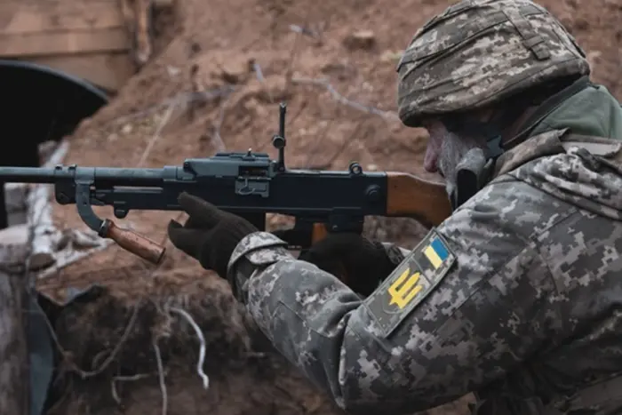 Fighters in a combat position in Sumy