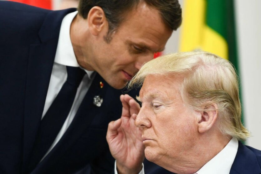 Portrait of Macron and Merkel with the Ukrainian flag